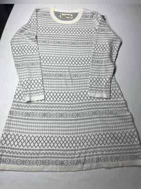 Aventura white and grey patterned sweater dress with long sleeves.